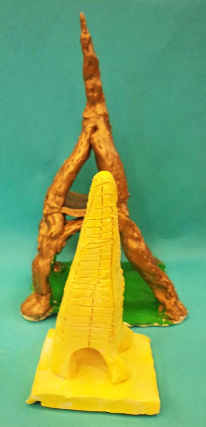 We have finally finished glazing all the clay pottery and sculptures. Here are two Eiffel Towers by a third and a fourth grader who were not inspired by each other.